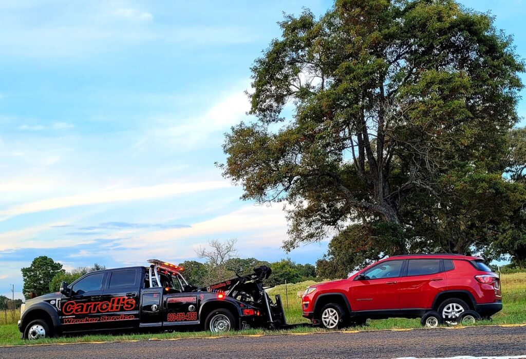 Flatbed towing service in Palestine TX loading vehicle roadside