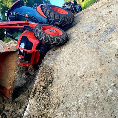 Ditch recovery towing service in Palestine TX pulling vehicle from roadside